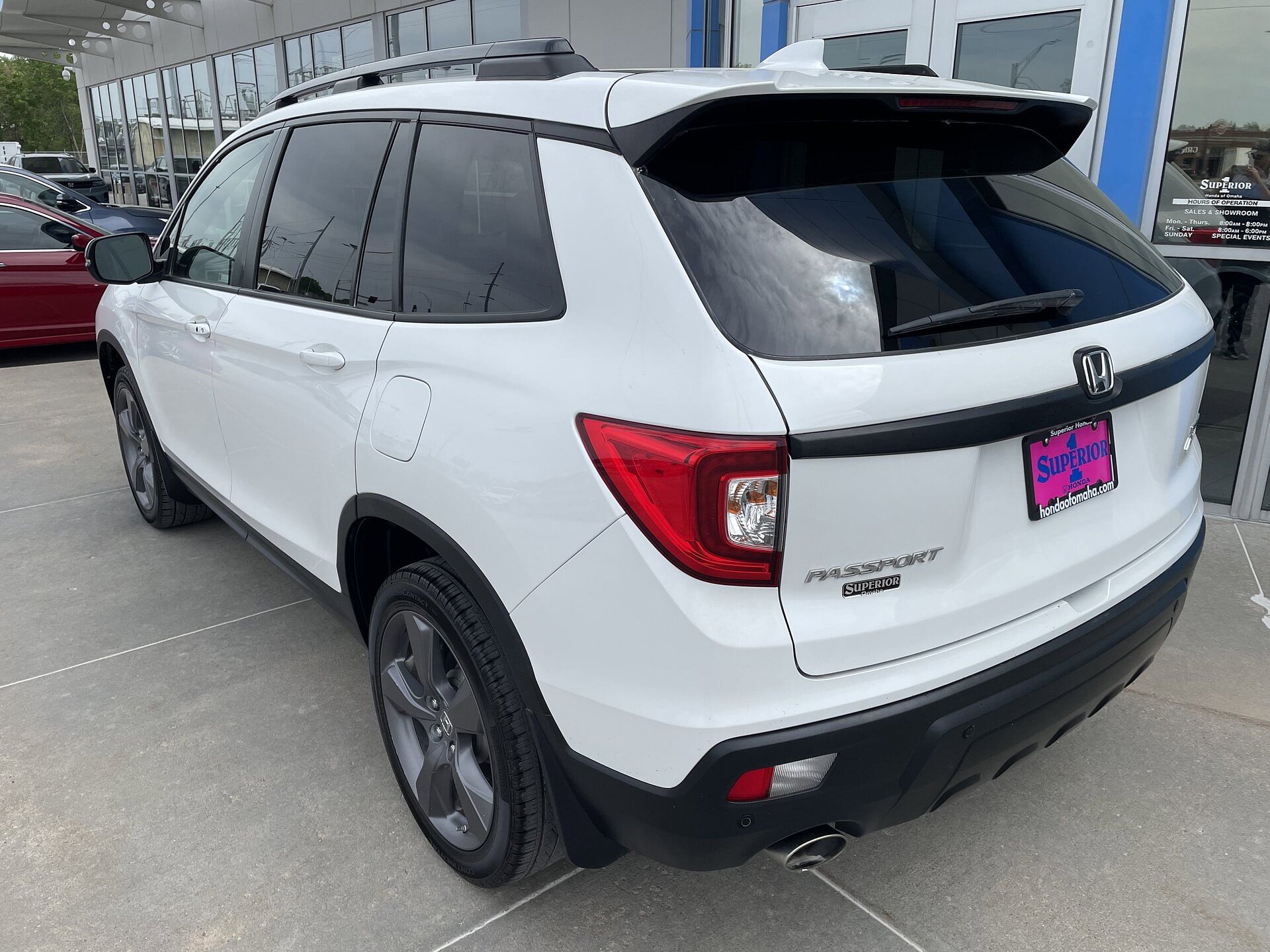 Used 2021 Honda Passport Touring with VIN 5FNYF8H96MB004726 for sale in Omaha, NE