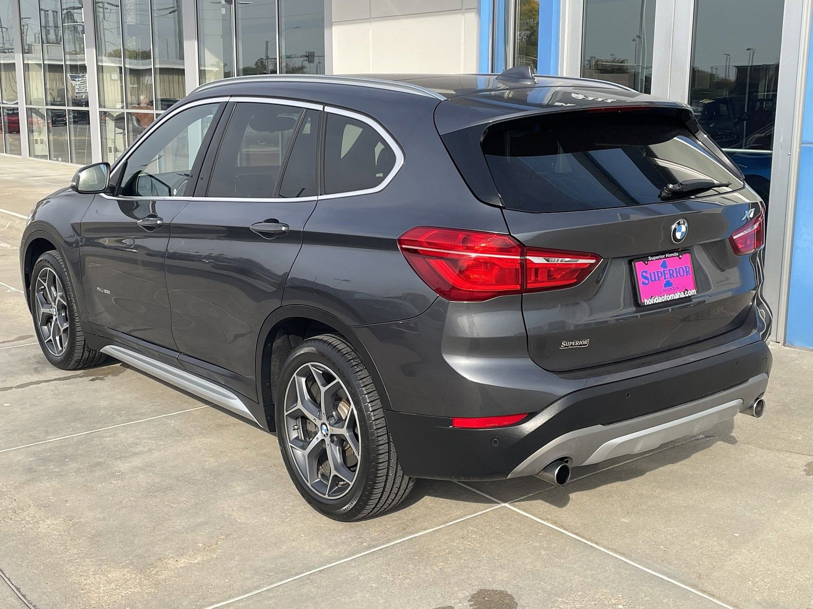 Used 2017 BMW X1 28i with VIN WBXHT3C36H5F87083 for sale in Omaha, NE