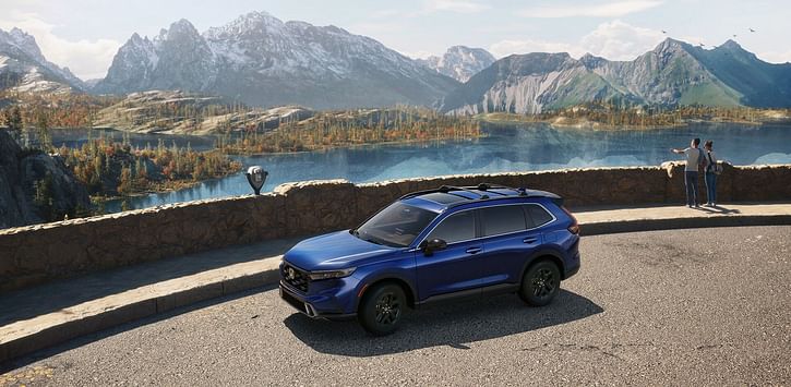 Honda 2023 CR-V Blue. Mountains in the background