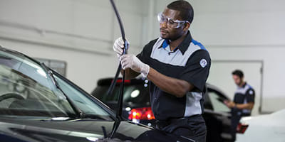 Mechanic working on wiper blades