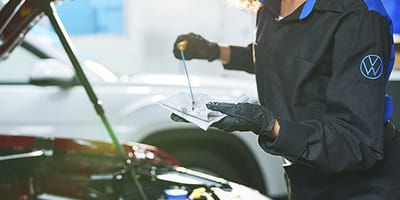 Mechanic changing the oil