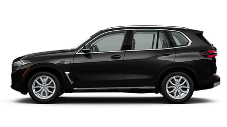 Driver side view of a black BMW X5 on a white background.