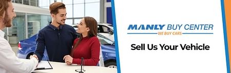 On the left, a salesman shakes hands with a kiltman who is looking at a woman in a red sweater. Cars in the background. On the right logo manly buy center we buy cars, below black text sell us your vehicle on white background