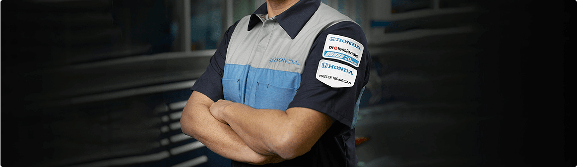 photo of mechanic in t-shirt honda