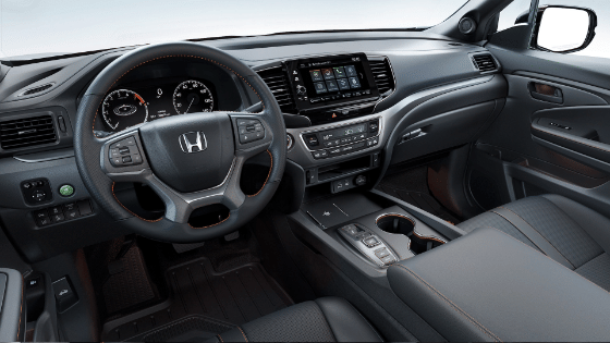 2026 Honda Ridgeline Trailsport in Black interior, cabin driver side view.