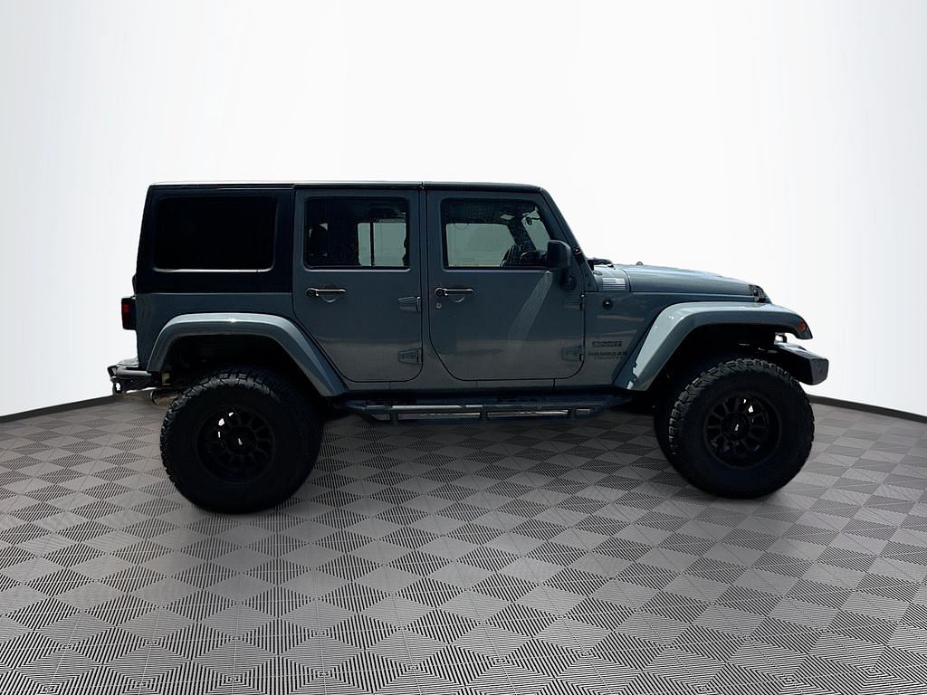Used 2015 Jeep Wrangler Unlimited Sport with VIN 1C4BJWDG3FL545343 for sale in Diberville, MS