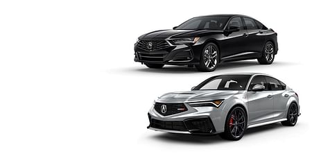 A silver Integra and a black TLX on a white background.