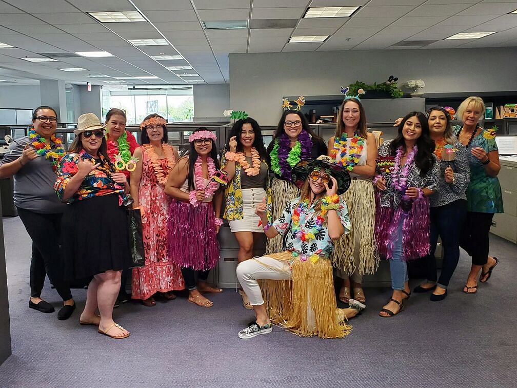 people posing to photos in  Aloha Luau outfit