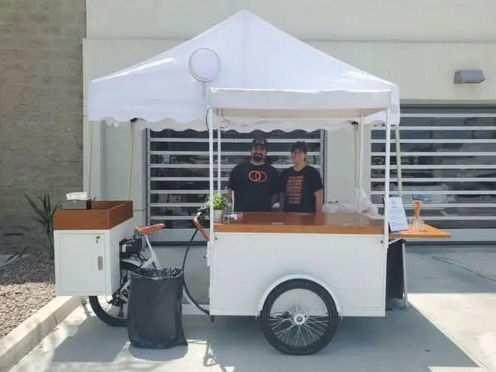 Ice cream cart with people