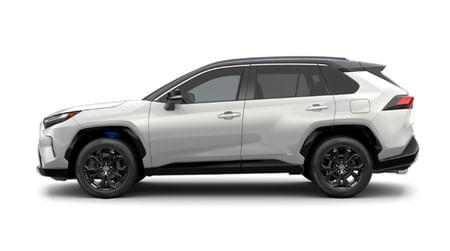 Driver side view of a white Toyota RAV4 Hybrid on a white background.