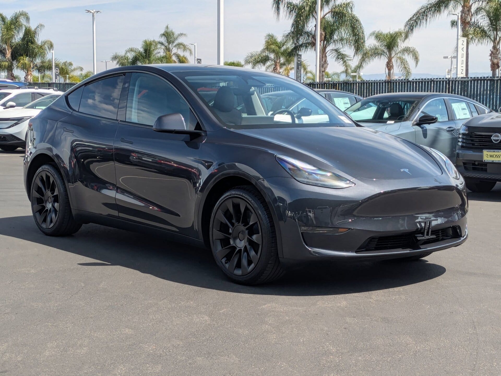 Used 2024 Tesla Model Y Long Range with VIN 7SAYGDEE5RA224020 for sale in San Diego, CA