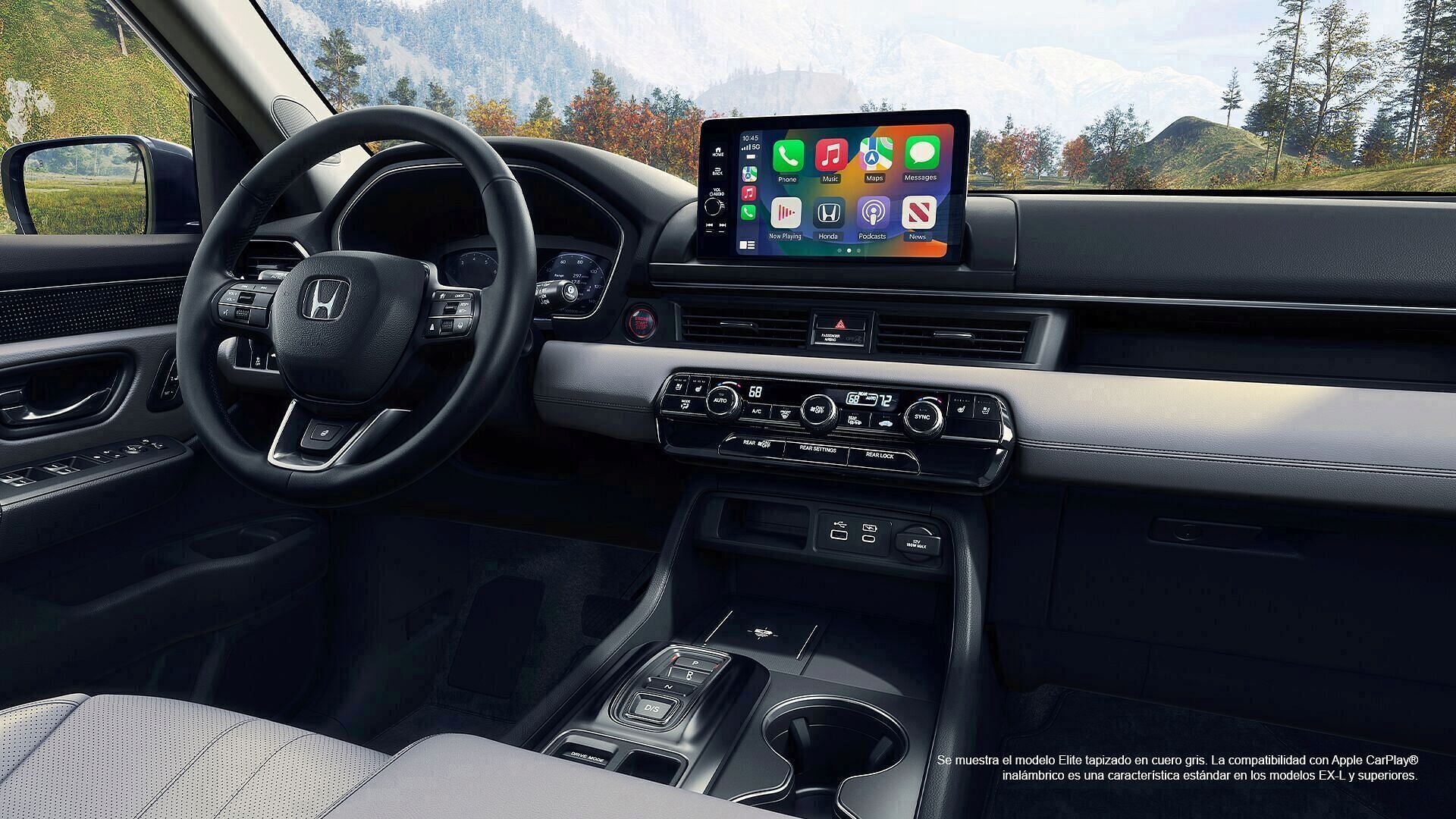 Interior del Honda Pilot Elite 2023 en cuero gris. Compatibilidad inalámbrica con Apple CarPlay de serie en EX-L y superiores.