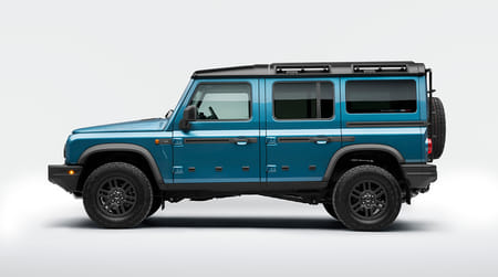 Driver side view of a blue 2026 Station Wagon on a white background.