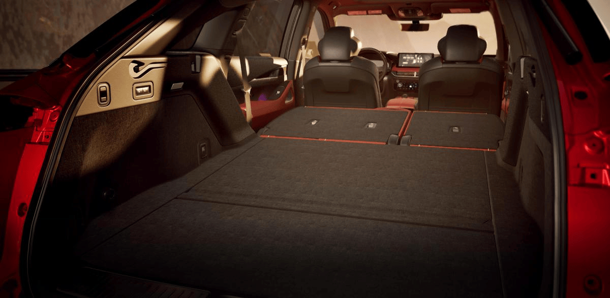 Rear exterior view of the 2027 INFINITI QX65 highlighting cargo space in cargo area