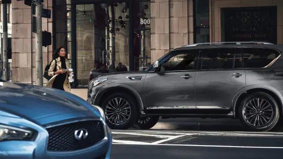 QX80 parked on busy street