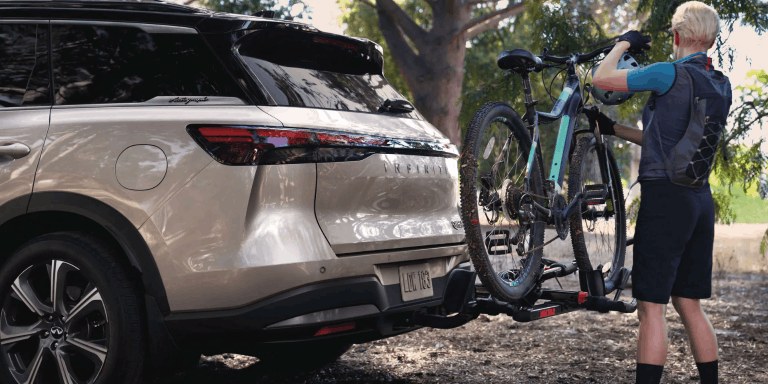 2026 INFINITI QX60 with bike rack accessory installed on rear liftgate