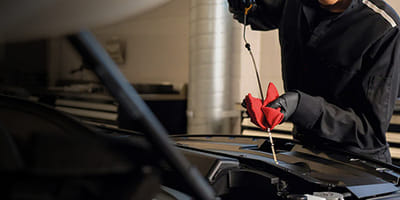 Mechanic working on oil change