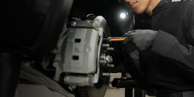 Mechanic working on the brake