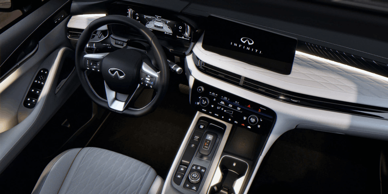 Above view of 2026 INFINITI QX60 Luxury Crossover SUV interior highlighting driver console.