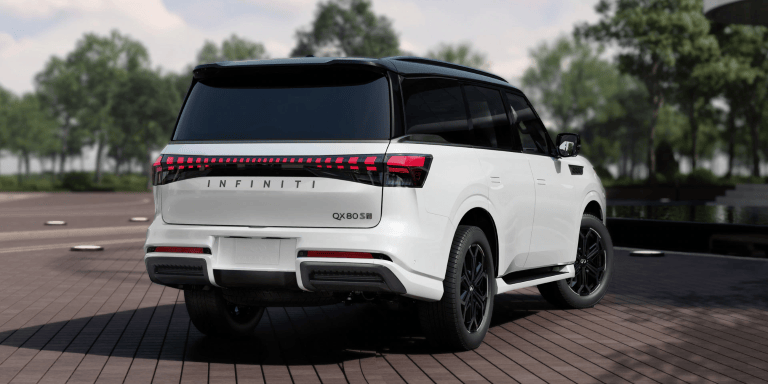 Rear view of 2026 INFINITI QX80 full-size SUV in Radiant White.