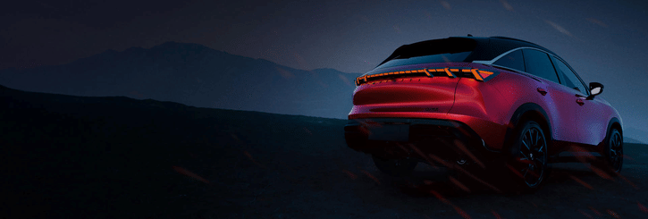 Exterior close up of the 2027 INFINITI QX65 rear illuminated taillights