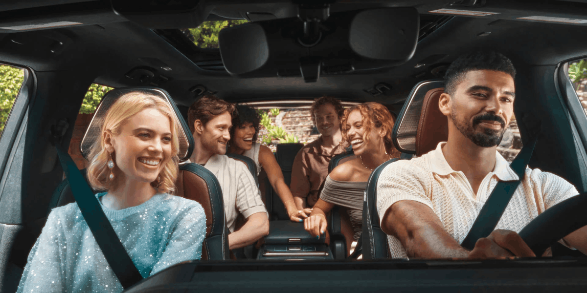 Spacious three-row seating cabin of the 2026 INFINITI QX80, demonstrating room for five to seven passengers.