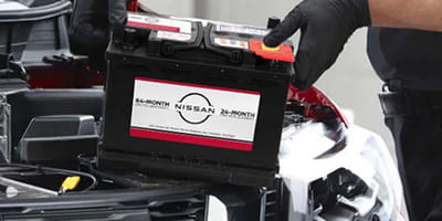 Mechanic changing battery