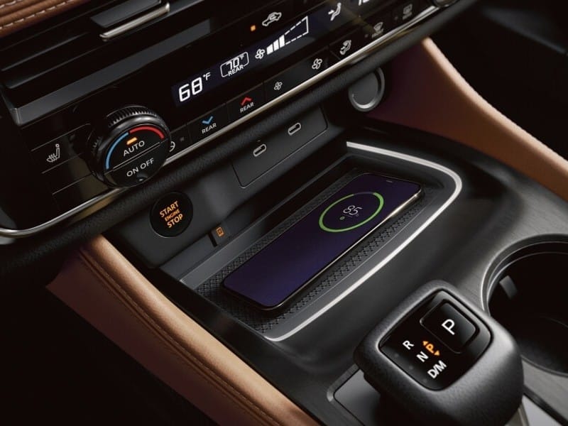 Sleek 2026 Nissan Rogue interior featuring a modern wireless charging pad for effortless device charging on the go.