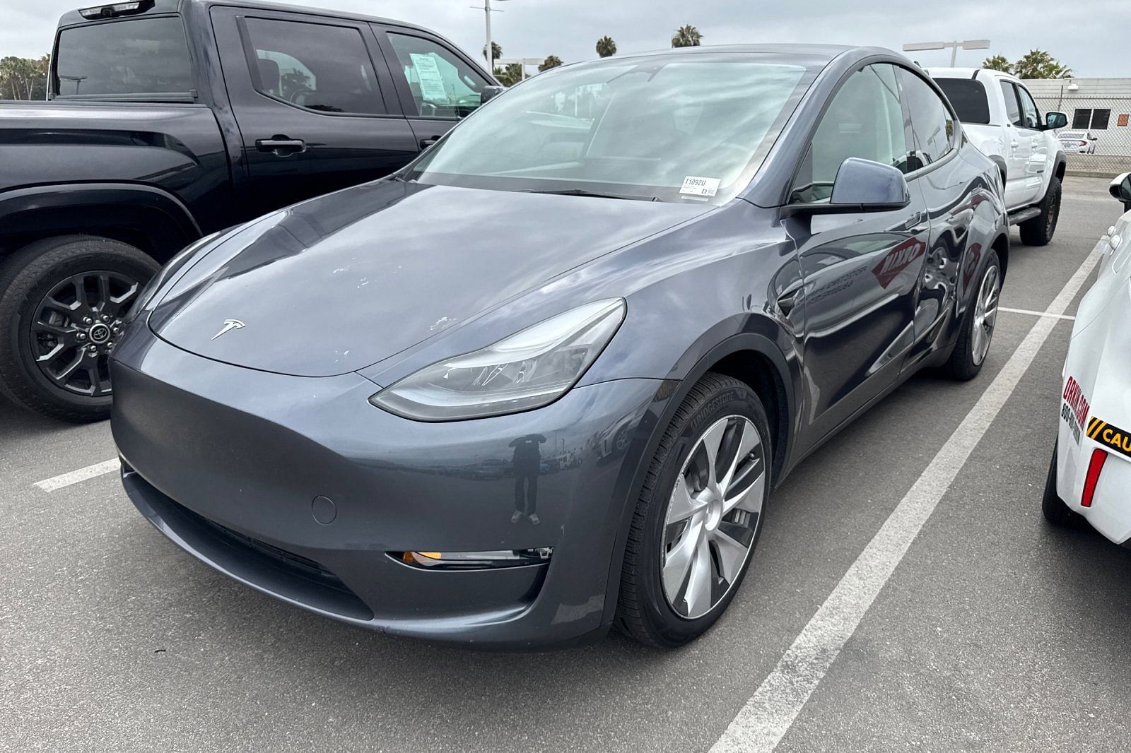 Used 2023 Tesla Model Y Long Range with VIN 7SAYGAEE1PF773499 for sale in Kansas City