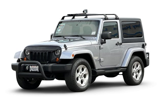 1 placeholder image of  2013 Jeep Wrangler Sahara