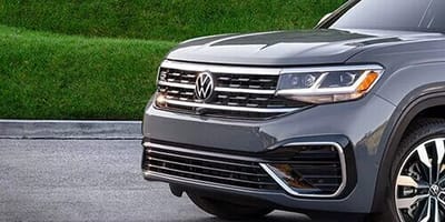 Man standing in front of VW Service Center