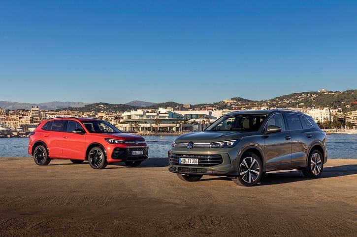 Two cars on the beach.
