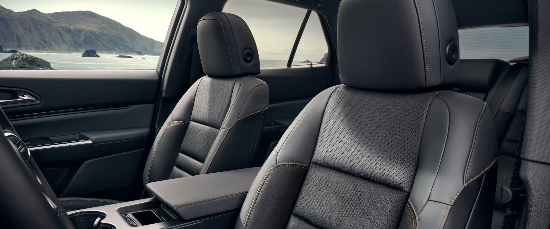 Interior view of the 2025 Honda Prologue showing the black perforated leather front seats with contrast stitching