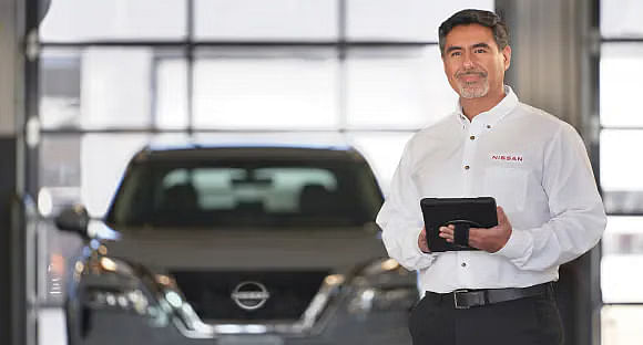 Nissan salesperson in the showroom