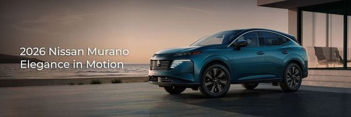 A 2026 Nissan Murano driving across a bridge with a scenic view in the background.