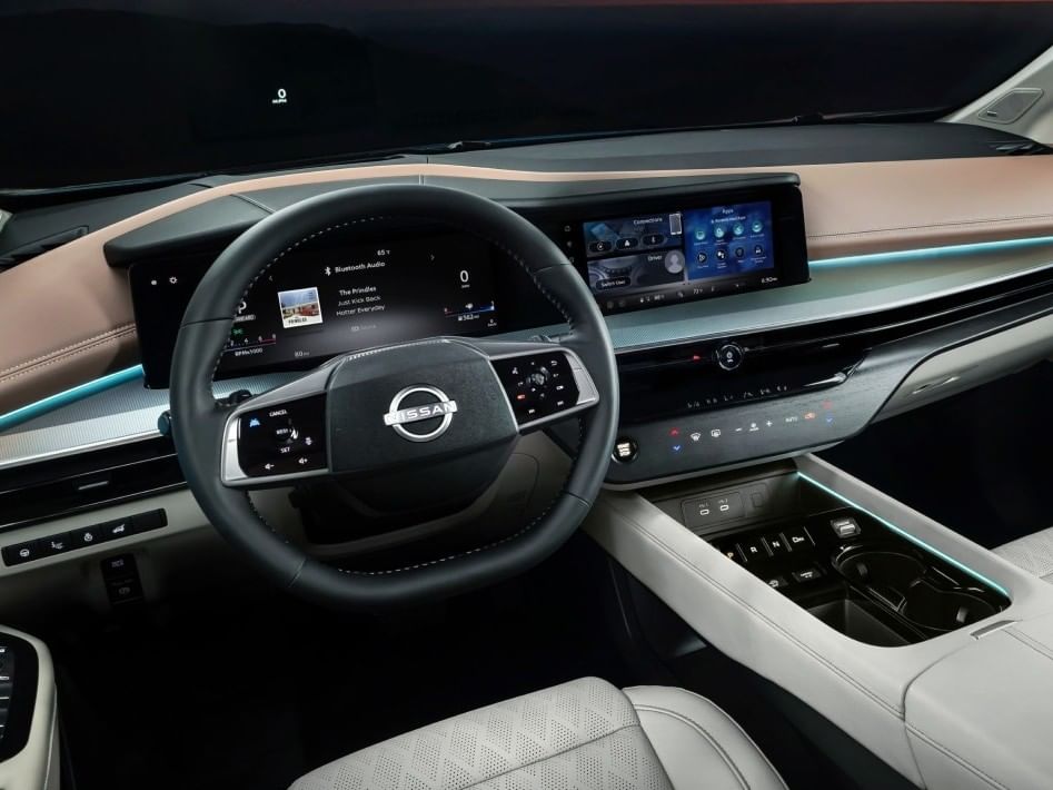 A 2026 Nissan Murano interior featuring a sleek dashboard, digital displays, a stylish steering wheel, and leather upholstery.