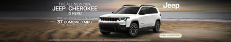 White Jeep Cherokee on the beach