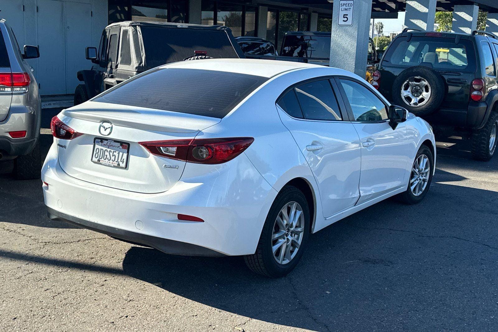 Used 2014 Mazda MAZDA3 i Touring with VIN JM1BM1V77E1195329 for sale in National City, CA