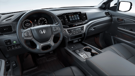 2026 Honda Ridgeline Trailsport in Black interior, cabin driver side view.