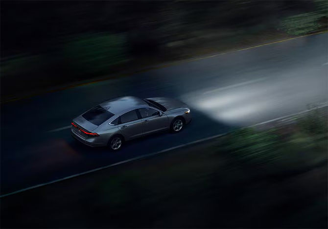 View of the 2025 Honda Accord's standard full LED headlights, highlighting their performance.