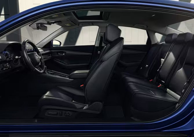 View of the spacious rear seating area in the 2025 Honda Accord, highlighting passenger comfort and available split-folding seats.