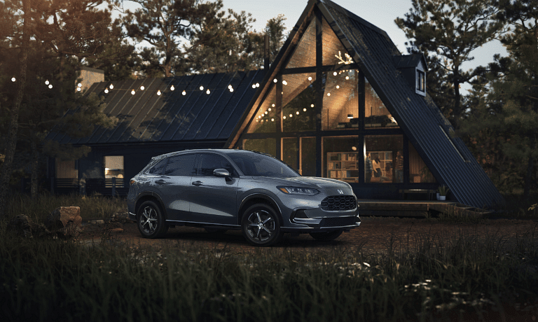 2025 Honda HR-V parked by an A-Frame house