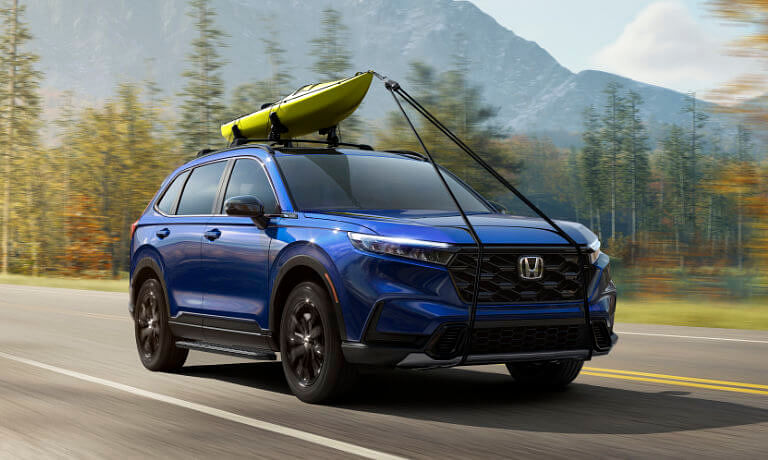 2025 Honda CR-V driving with a kayak