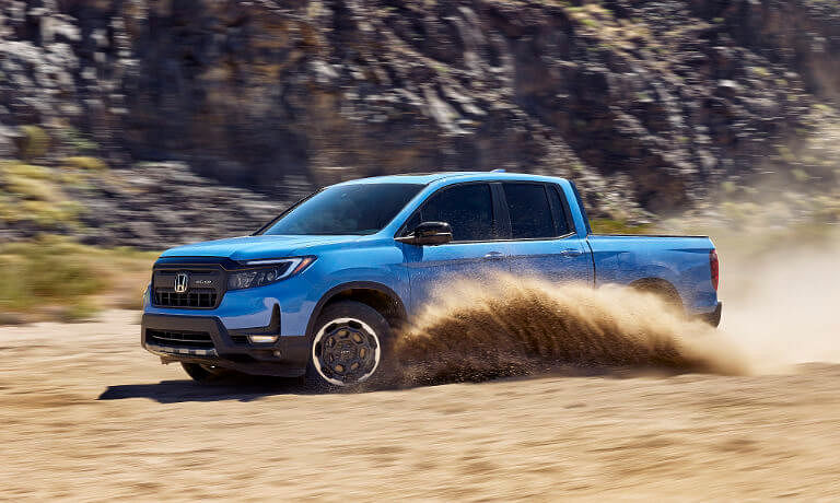 2025 Honda Ridgeline driving in sand