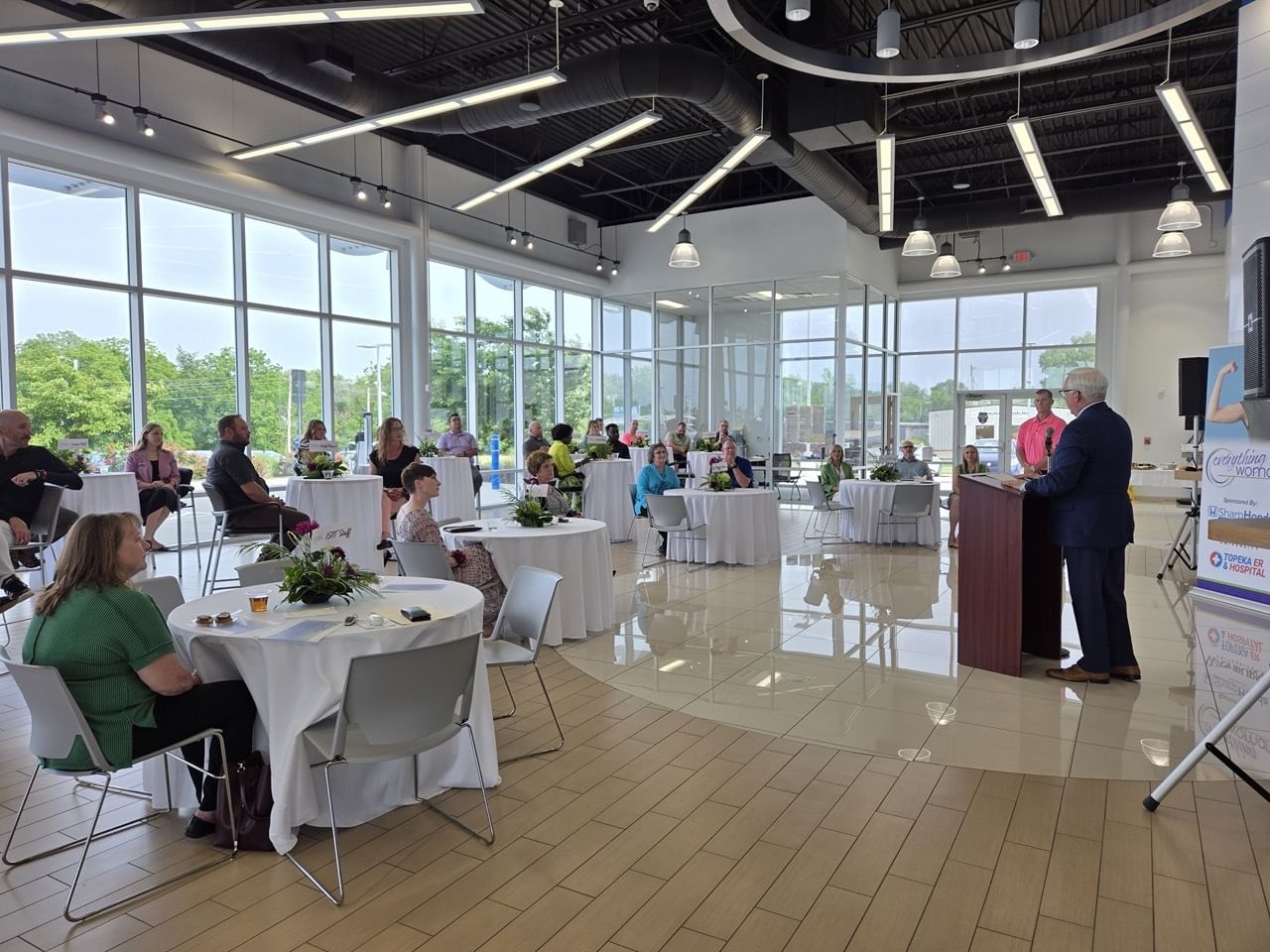 Wide shot of guests at tables during 'Everything Woman' Awards Banquet.