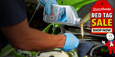 Mechanic Changing Oil