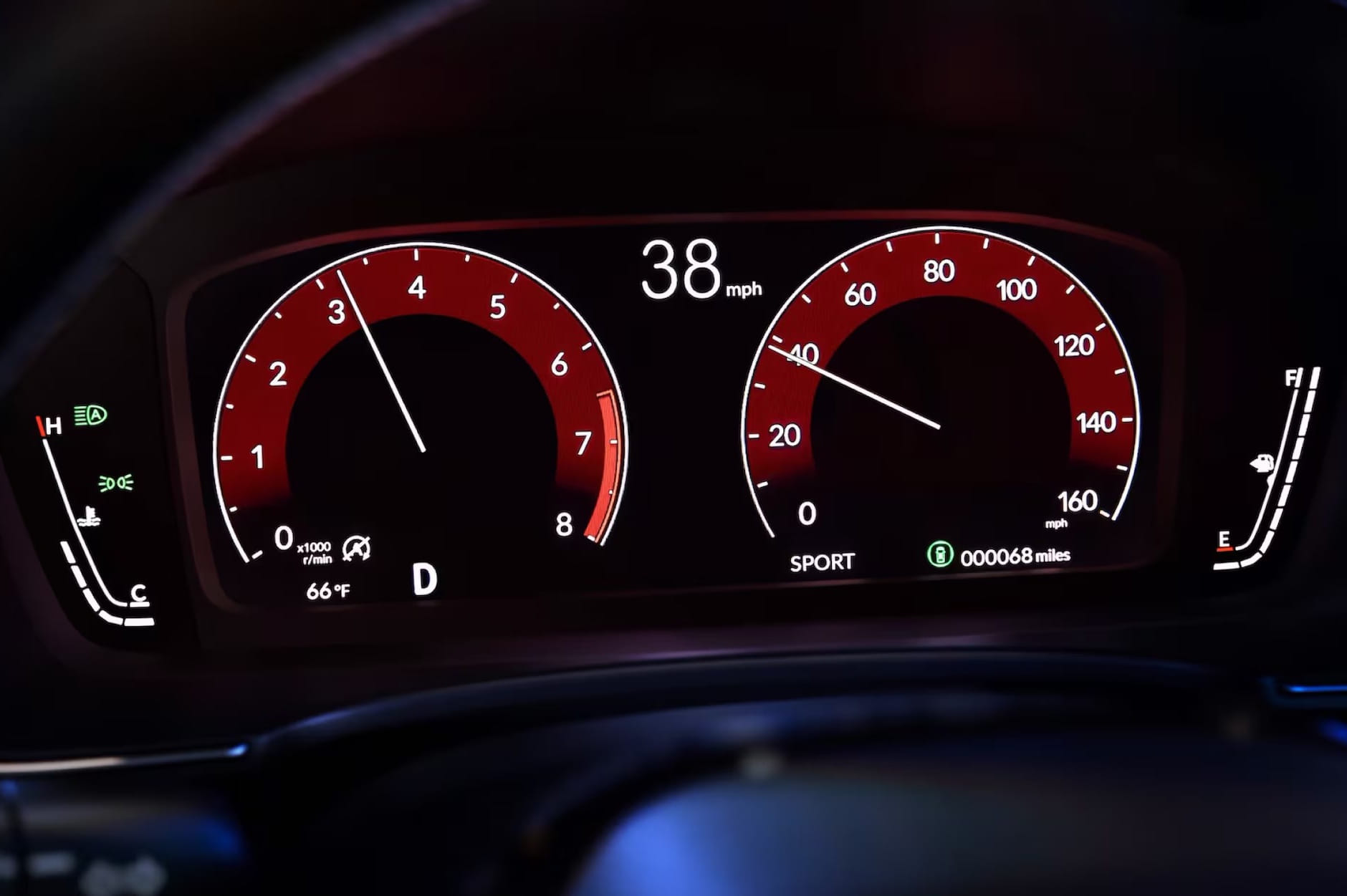 2026 Honda Civic Hatchback dashboard displays two red dials for RPM and speed. Speed is 38 mph, RPM at 1400, fuel gauge is low, ambient temp 66°F, and odometer at 68 miles.