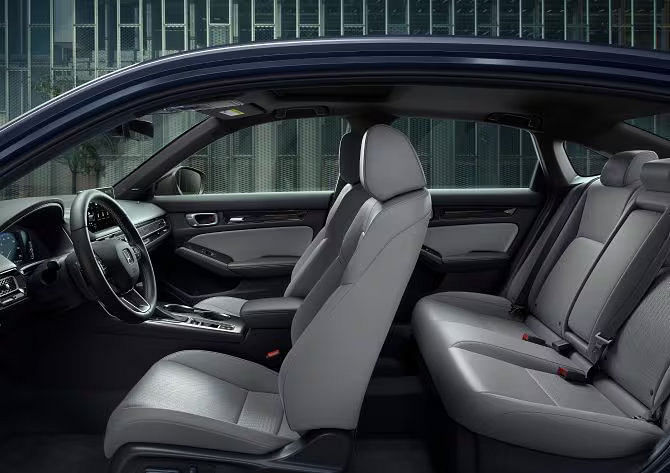 View of the inside of 2025 Honda Civic Hybrid looking up through the side doors.