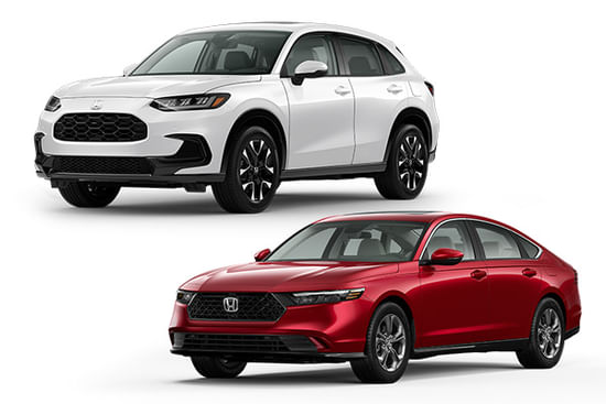 A red Accord Hybrid with a white HR-V on a white background.