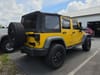 3 thumbnail image of  2011 Jeep Wrangler Unlimited Sport
